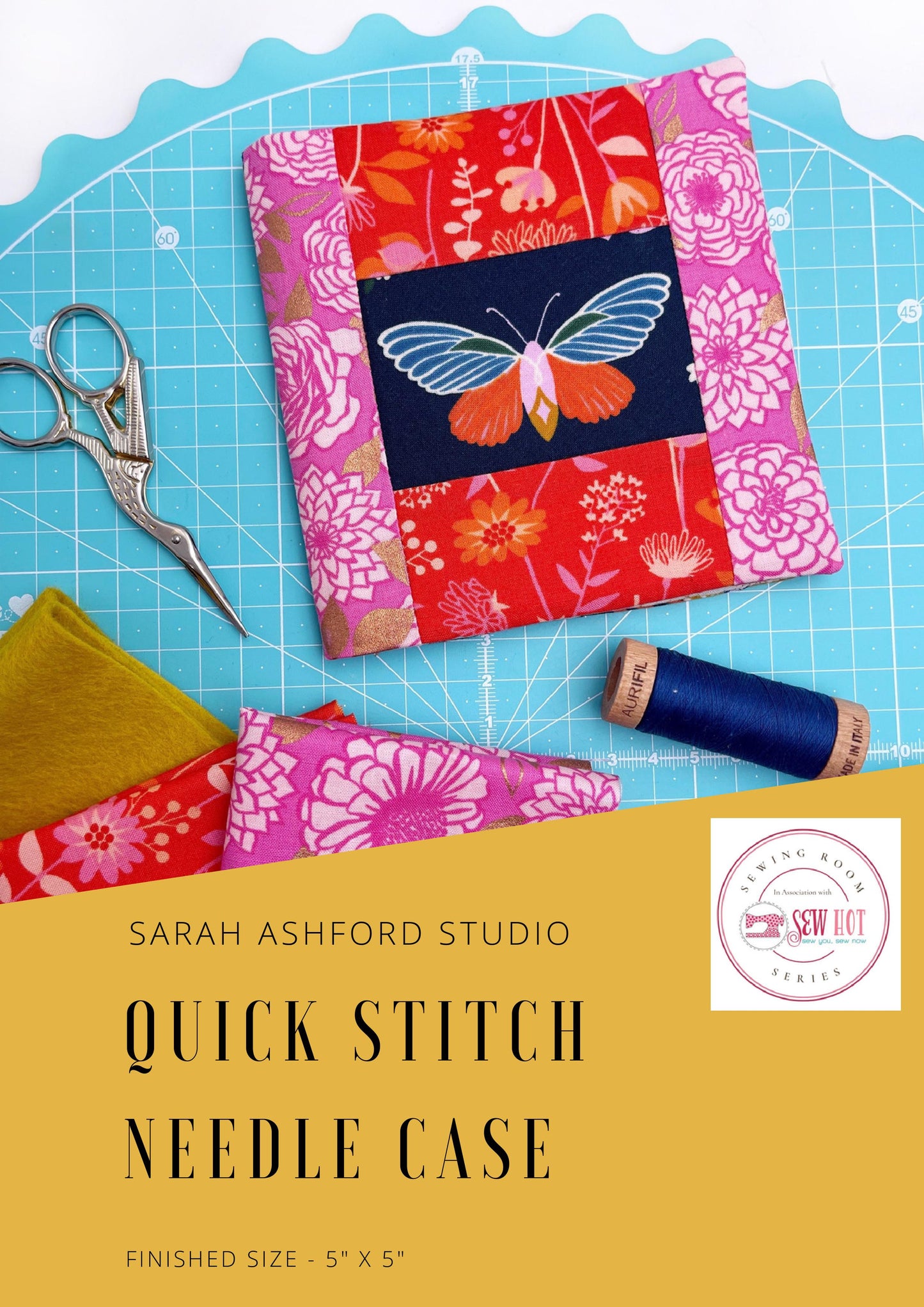 Sewing pattern. A needle case with a moth in the centre of the front sits on a cutting mat, along with some fabric, scissors and Aurifil thread.